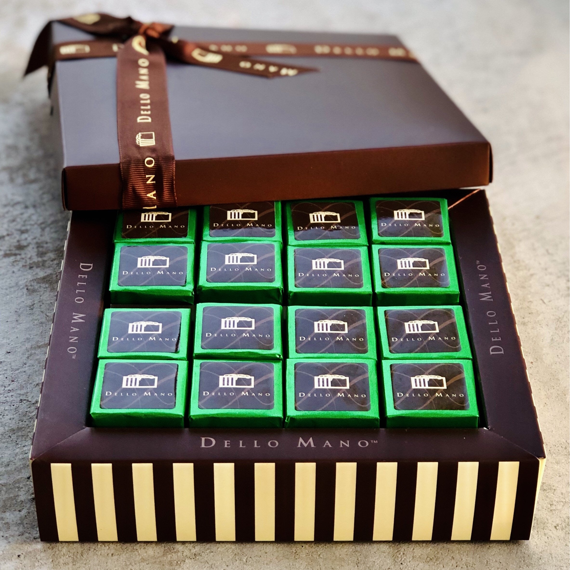 A delicious Chocolate Gift Box of handmade Vegan Brownies.  Our  very own Vegan Brownie Recipe uses quality ingredients to create this stunning food gift for Vegans. Presented in a timelessly elegant gift box and beautifully presented you will impress with this Vegan Gift. 